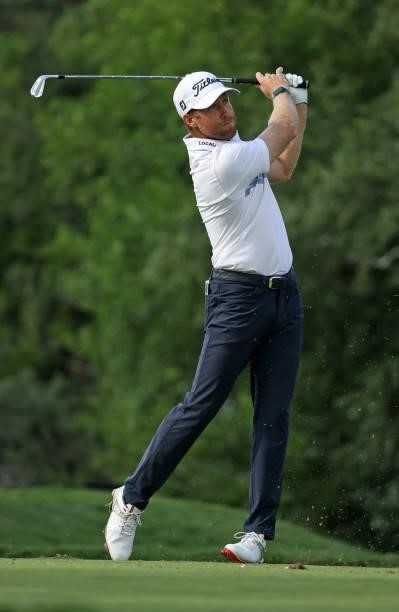 Tyler Duncan plays his shot from the ninth tee during the first round of the Rocket Mortgage Classic on July 01, 2021 at the Detroit Golf Club in...