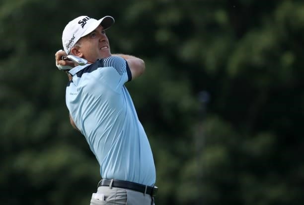 Martin Laird of Scotland plays his shot from the ninth tee during the first round of the Rocket Mortgage Classic on July 01, 2021 at the Detroit Golf...