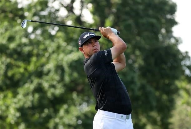 Gary Woodland plays his shot from the ninth tee during the first round of the Rocket Mortgage Classic on July 01, 2021 at the Detroit Golf Club in...