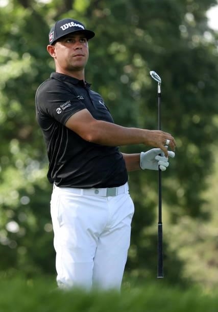 Gary Woodland plays his shot from the ninth tee during the first round of the Rocket Mortgage Classic on July 01, 2021 at the Detroit Golf Club in...