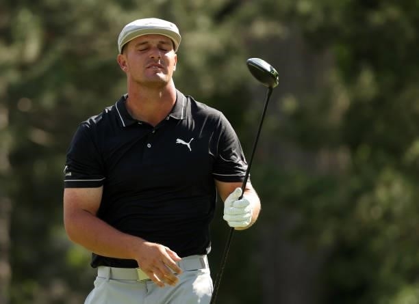 Bryson DeChambeau reacts to his shot from the fourth tee during the first round of the Rocket Mortgage Classic on July 01, 2021 at the Detroit Golf...