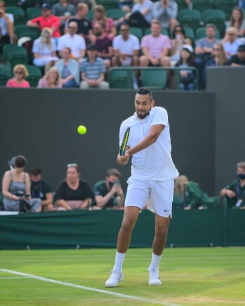 Nick Kyrgios of Australia hits a backhand against Gianluca Mager of Italy in the second round of the gentlemen's singles during Day Four of The...