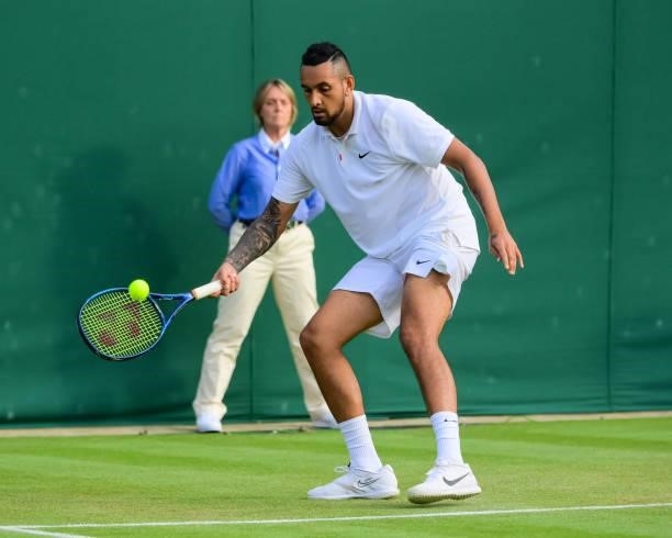 Nick Kyrgios of Australia hits a forehand against Gianluca Mager of Italy in the second round of the gentlemen's singles during Day Four of The...