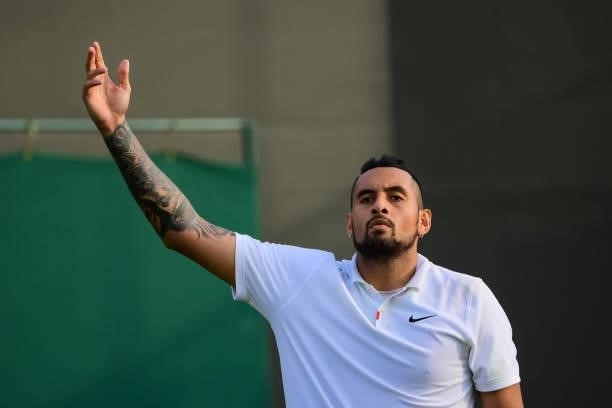 Nick Kyrgios of Australia encourages the crowd to become more involved during his match against Gianluca Mager of Italy in the second round of the...