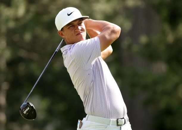 Cameron Champ plays his shot from the fourth tee during the first round of the Rocket Mortgage Classic on July 01, 2021 at the Detroit Golf Club in...