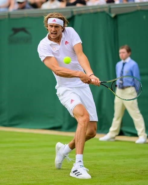 Alexander Zverev of Germany hits a backhand against Tennys Sandgren of the United States in the second round of the gentlemen's singles during Day...
