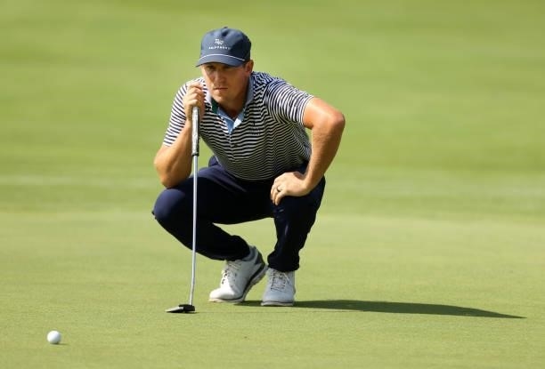 Kramer Hickok lines up a putt on the second green during the first round of the Rocket Mortgage Classic on July 01, 2021 at the Detroit Golf Club in...