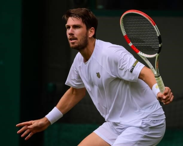 Cameron Norrie of Great Britain hits a backhand against Alex Bolt of Australia in the second round of the gentlemen's singles during Day Four of The...