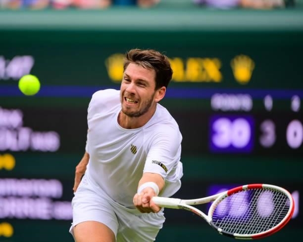 Cameron Norrie of Great Britain hits a forehand against Alex Bolt of Australia in the second round of the gentlemen's singles during Day Four of The...