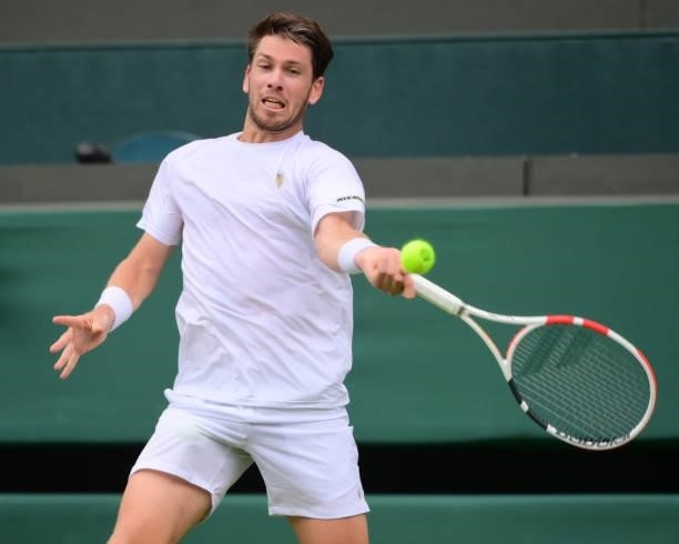 Cameron Norrie of Great Britain hits a forehand against Alex Bolt of Australia in the second round of the gentlemen's singles during Day Four of The...