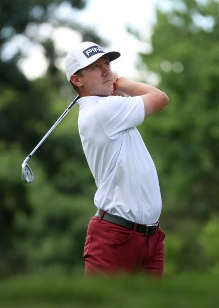 MacKenzie Hughes of Canada plays his shot from the ninth tee during the first round of the Rocket Mortgage Classic on July 01, 2021 at the Detroit...
