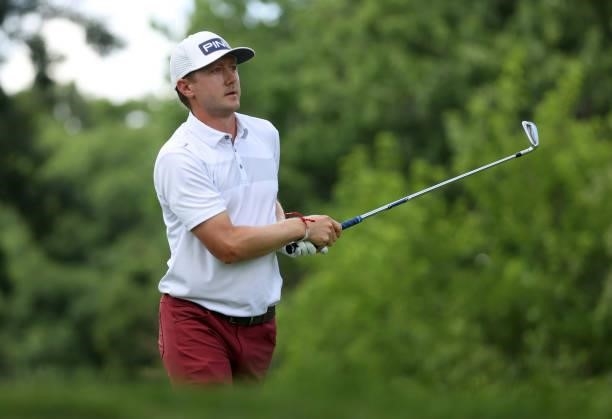 MacKenzie Hughes of Canada plays his shot from the ninth tee during the first round of the Rocket Mortgage Classic on July 01, 2021 at the Detroit...