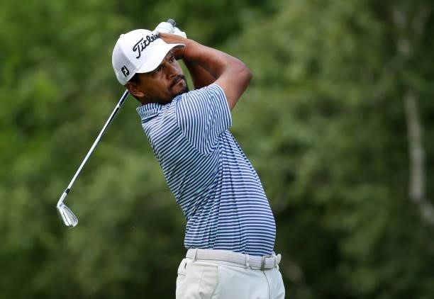Fabian Gomez of Argentina plays his shot from the ninth tee during the first round of the Rocket Mortgage Classic on July 01, 2021 at the Detroit...
