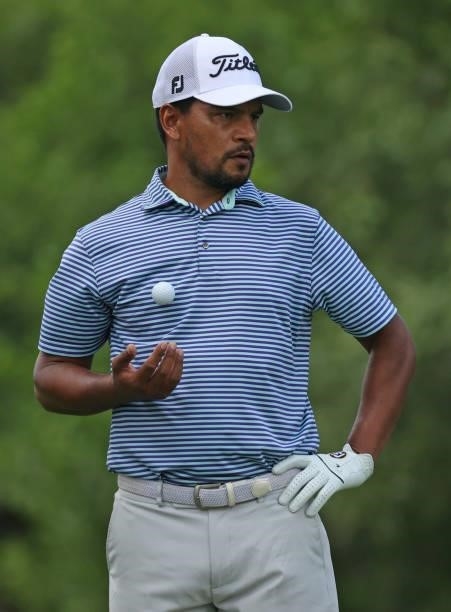 Fabian Gomez of Argentina prepares to play his shot from the ninth tee during the first round of the Rocket Mortgage Classic on July 01, 2021 at the...