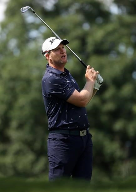 Ryan Brehm plays his shot from the ninth tee during the first round of the Rocket Mortgage Classic on July 01, 2021 at the Detroit Golf Club in...