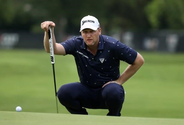 Ryan Brehm plays lines up a putt on the eighth green during the first round of the Rocket Mortgage Classic on July 01, 2021 at the Detroit Golf Club...