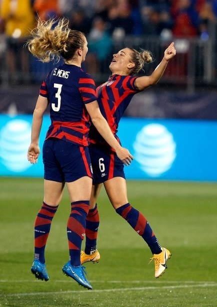 Samantha Mewis of the United States celebrates with Kristie Mewis after scoring a goal against Mexico at Rentschler Field on July 01, 2021 in East...