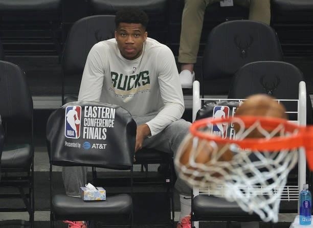 Giannis Antetokounmpo of the Milwaukee Bucks looks on before Game Five of the Eastern Conference Finals against the Atlanta Hawks at Fiserv Forum on...