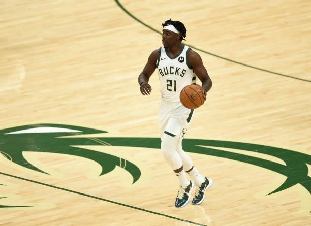 Jrue Holiday of the Milwaukee Bucks brings the ball up court against the Atlanta Hawks in Game Five of the Eastern Conference Finals at Fiserv Forum...