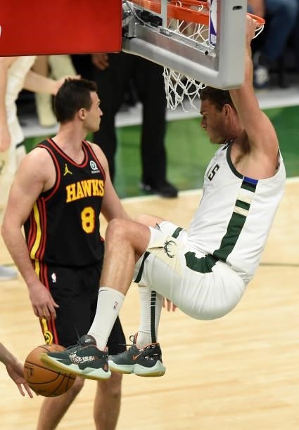 Brook Lopez of the Milwaukee Bucks dunks against the Atlanta Hawks during the first quarter in Game Five of the Eastern Conference Finals at Fiserv...