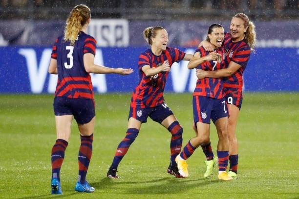 Tobin Heath of United States celebrates with Lindsey Horan, Emily Sonnett Samantha Mewis after scoring a goal against Mexico at Rentschler Field on...