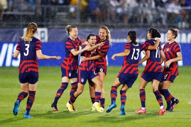 Tobin Heath of United States celebrates with teammates after scoring a goal against Mexico at Rentschler Field on July 01, 2021 in East Hartford,...