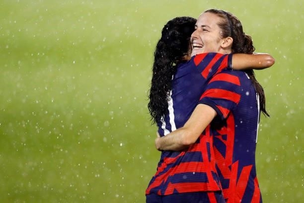 Christen Press of United States celebrates with Tierna Davidson after scoring a goal against Mexico at Rentschler Field on July 01, 2021 in East...