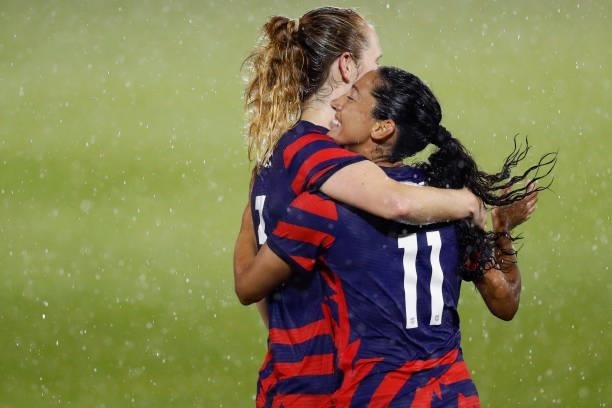 Christen Press of United States celebrates with Samantha Mewis after scoring a goal against Mexico at Rentschler Field on July 01, 2021 in East...