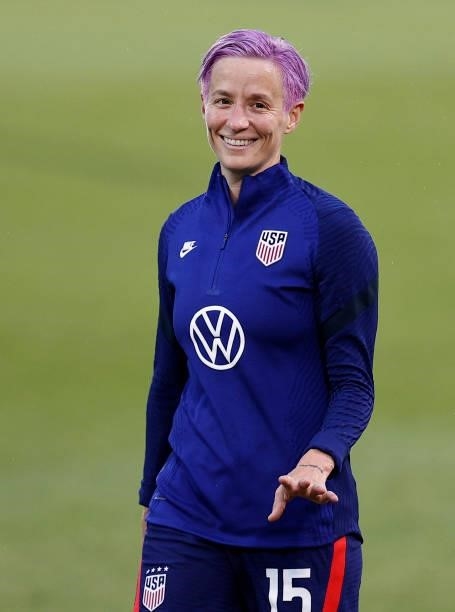 Megan Rapinoe of United States waves to fans before the game between the United States and Mexico at Rentschler Field on July 01, 2021 in East...