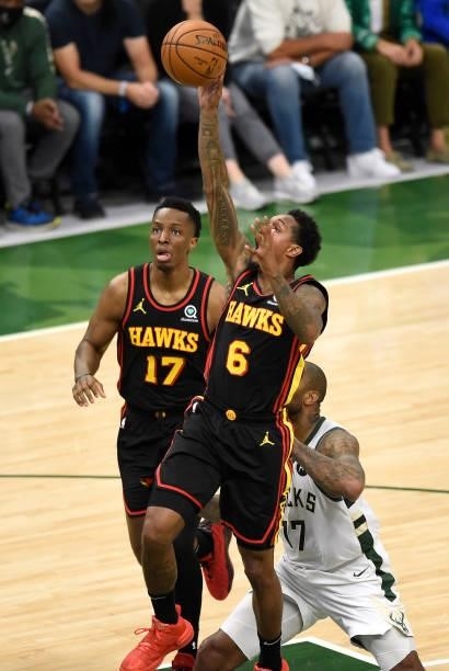 Lou Williams of the Atlanta Hawks goes up for a shot against the Milwaukee Bucks during the second half in Game Five of the Eastern Conference Finals...