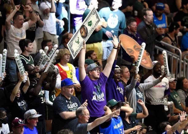 Milwaukee Bucks fans react during an Atlanta Hawks free throw during the second half in Game Five of the Eastern Conference Finals at Fiserv Forum on...