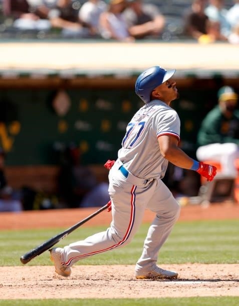 Andy Ibanez of the Texas Rangers bats against the Oakland Athletics at RingCentral Coliseum on July 01, 2021 in Oakland, California.