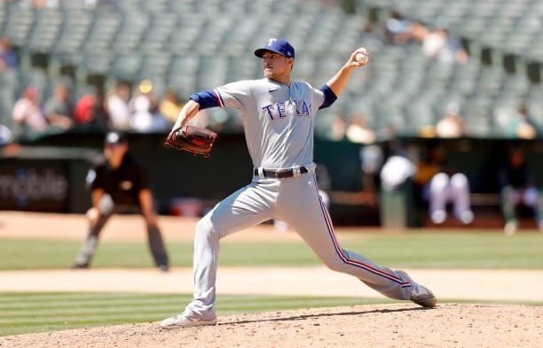 Brett Martin of the Texas Rangers pitches against the Oakland Athletics at RingCentral Coliseum on July 01, 2021 in Oakland, California.