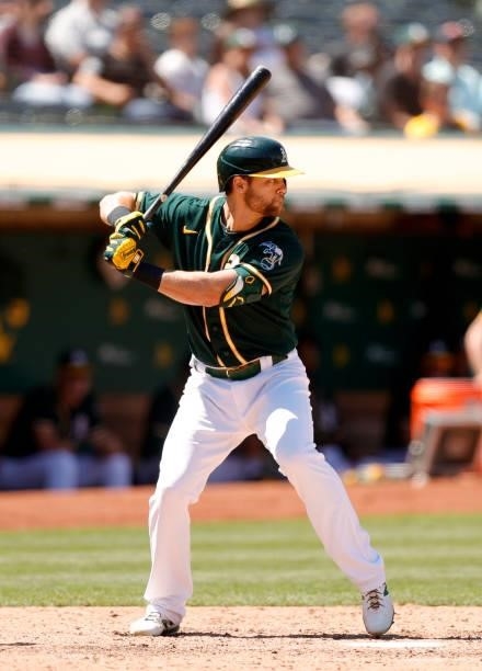 Chad Pinder of the Oakland Athletics bats against the Texas Rangers at RingCentral Coliseum on July 01, 2021 in Oakland, California.