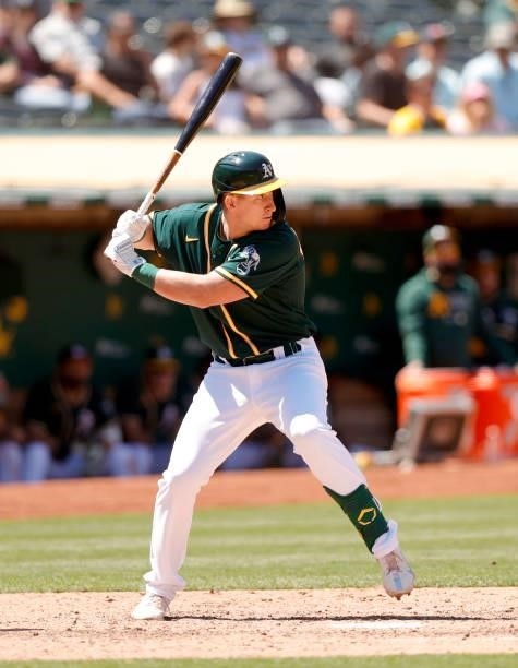 Frank Schwindel of the Oakland Athletics bats against the Texas Rangers at RingCentral Coliseum on July 01, 2021 in Oakland, California.