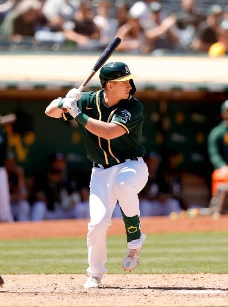 Frank Schwindel of the Oakland Athletics bats against the Texas Rangers at RingCentral Coliseum on July 01, 2021 in Oakland, California.