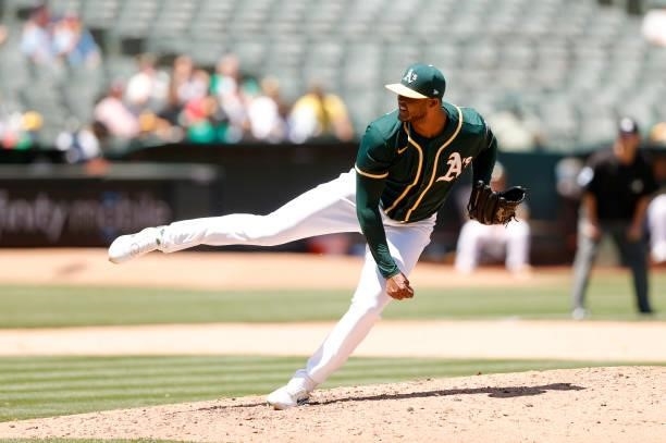 Domingo Acevedo of the Oakland Athletics pitches against the Texas Rangers at RingCentral Coliseum on July 01, 2021 in Oakland, California.