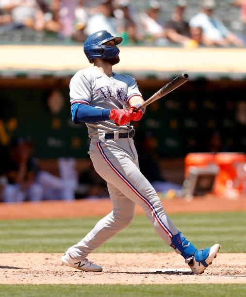 Joey Gallo of the Texas Rangers hits a two-run home run in the fifth inning against the Oakland Athletics at RingCentral Coliseum on July 01, 2021 in...