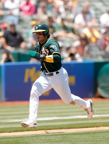 Ramon Laureano of the Oakland Athletics runs to home plate against the Texas Rangers at RingCentral Coliseum on July 01, 2021 in Oakland, California.
