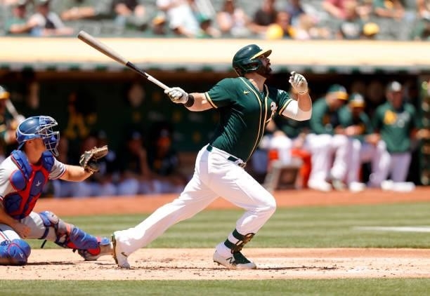 Mitch Moreland of the Oakland Athletics bats against the Texas Rangers at RingCentral Coliseum on July 01, 2021 in Oakland, California.