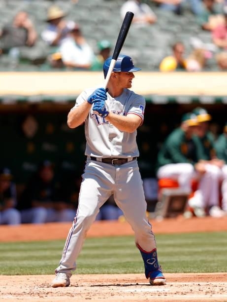 John Hicks of the Texas Rangers bats against the Oakland Athletics at RingCentral Coliseum on July 01, 2021 in Oakland, California.