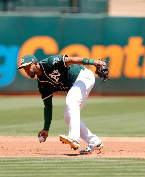 Elvis Andrus of the Oakland Athletics throws out Nick Solak of the Texas Rangers in the second inning at RingCentral Coliseum on July 01, 2021 in...