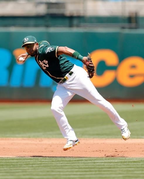 Elvis Andrus of the Oakland Athletics throws out Nick Solak of the Texas Rangers in the second inning at RingCentral Coliseum on July 01, 2021 in...