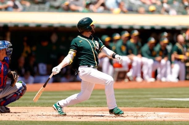 Jed Lowrie of the Oakland Athletics bats against the Texas Rangers at RingCentral Coliseum on July 01, 2021 in Oakland, California.