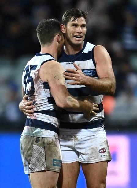 Tom Hawkins of the Cats is congratulated by Patrick Dangerfield after kicking a goal during the round 16 AFL match between Geelong Cats and Essendon...