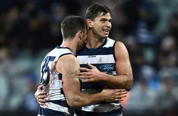 Tom Hawkins of the Cats is congratulated by Patrick Dangerfield after kicking a goal during the round 16 AFL match between Geelong Cats and Essendon...