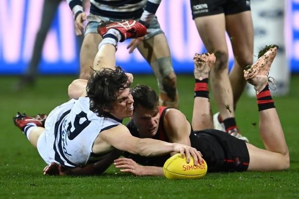 Max Holmes of the Cats dives for the ball during the round 16 AFL match between Geelong Cats and Essendon Bombers at GMHBA Stadium on July 02, 2021...