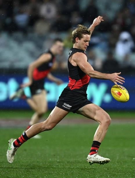 Darcy Parish of the Bombers kicks during the round 16 AFL match between Geelong Cats and Essendon Bombers at GMHBA Stadium on July 02, 2021 in...