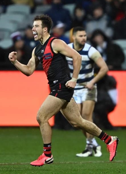 Zach Merrett of the Bombers celebrates kicking a goal during the round 16 AFL match between Geelong Cats and Essendon Bombers at GMHBA Stadium on...