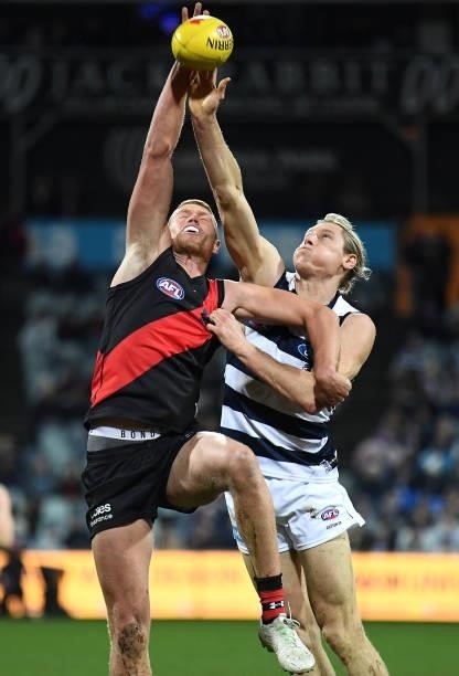 Peter Wright of the Bombers and Mark Blicavs of the Cats compete in the ruck during the round 16 AFL match between Geelong Cats and Essendon Bombers...